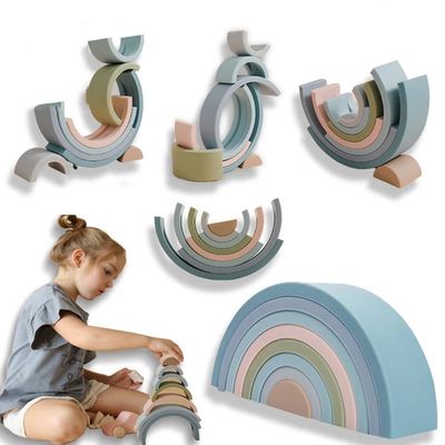 Categoría alimenticia libre de amontonamiento infantil educativa del apilador del silicón del arco iris del juguete BPA