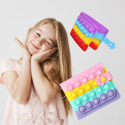 Los niños sensoriales de los juguetes del monedero del silicón de los productos del silicón del bebé juegan el arco iris de 2022 carteras de los niños